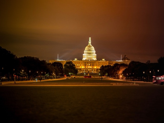 The United States Capitol illuminated at night