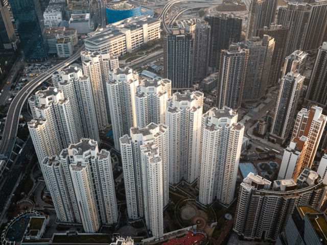Aerial view of tightly packed residential towers in Hong Kong